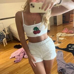 Hand designed two piece short and tank cherry set.